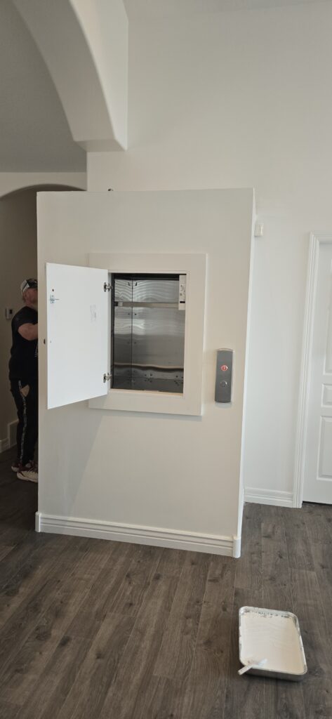 Dumbwaiter lift upper landing installed by Olympus Stair Lifts